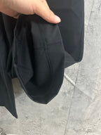 Black pants with hand pocket and gathered drawstring waist