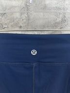 Navy waistband logo patch and stitched drawstring detail