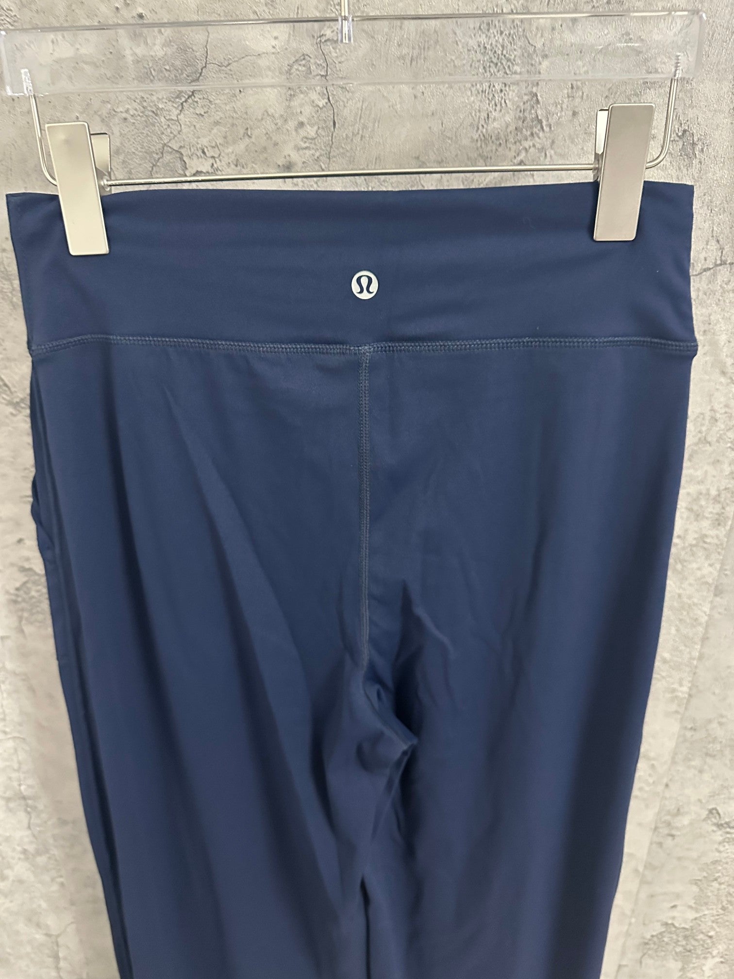 Navy wide-leg trousers with logo at waistband and drawstring