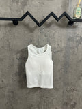White ribbed knit tank top on hanger