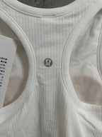 White ribbed knit tank top back with small logo