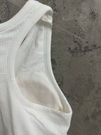 White ribbed knit tank top armhole and stitching