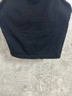 Ribbed tank top with curved hem and stitched bottom edge