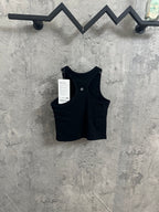 Ribbed dark tank top with crew neck and attached product tag on hanger