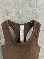 Brown sleeveless tank top back with wide scoop neck and interior label