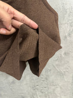 Brown sleeveless tank top knit fabric detail with draped folded side edge