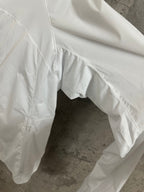 White hooded jacket sleeve and curved hem with elastic cuff