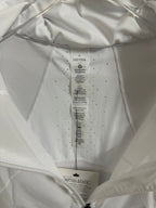 White jacket interior care label and size tag