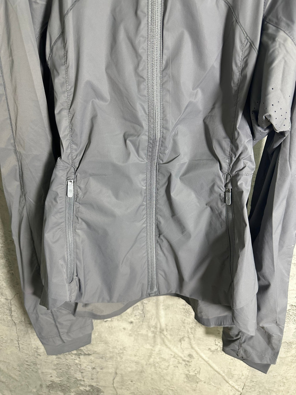 Ralph Lauren gray jacket close-up of full-length zipper and side pockets
