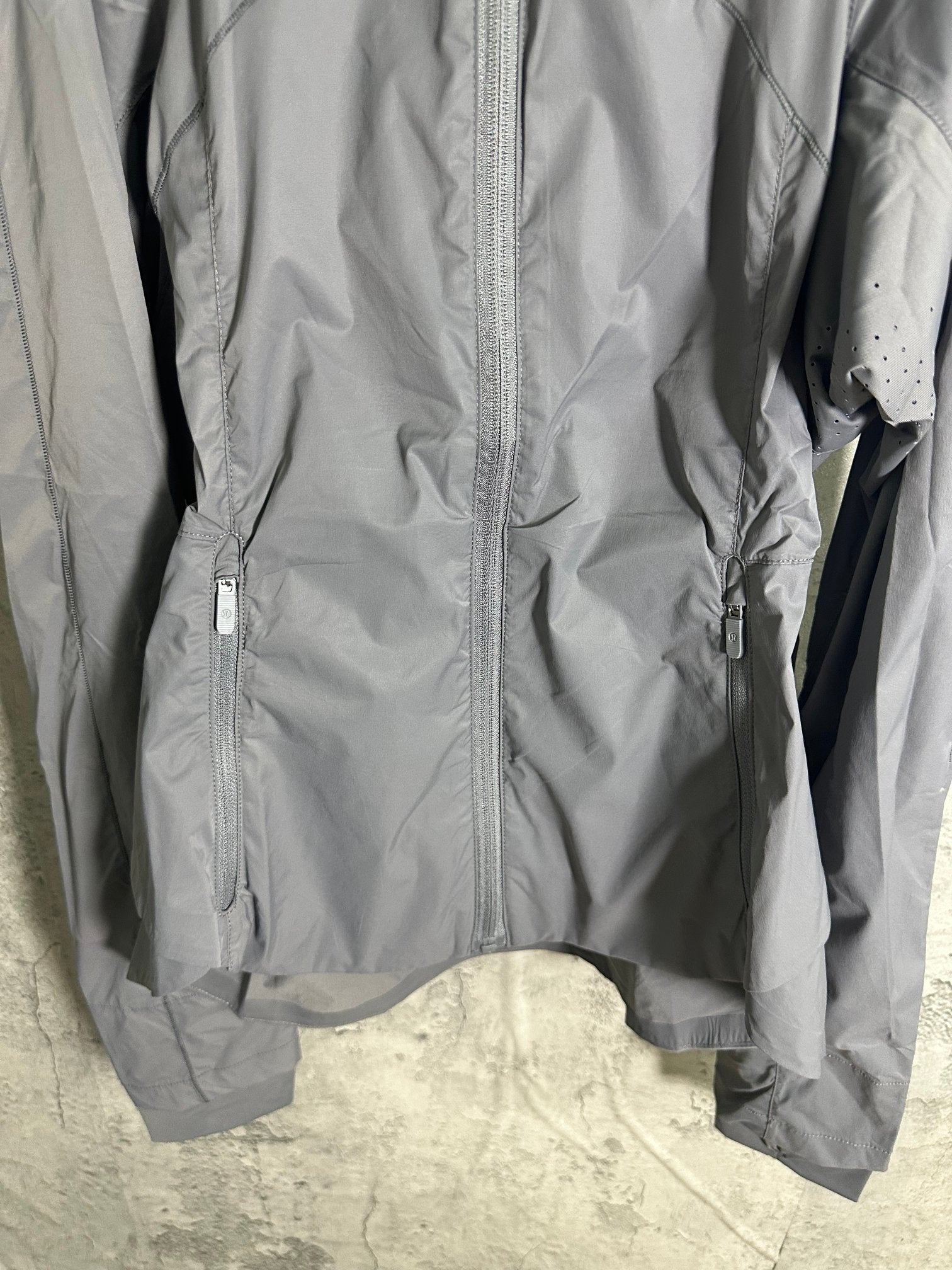 Ralph Lauren gray jacket close-up of full-length zipper and side pockets