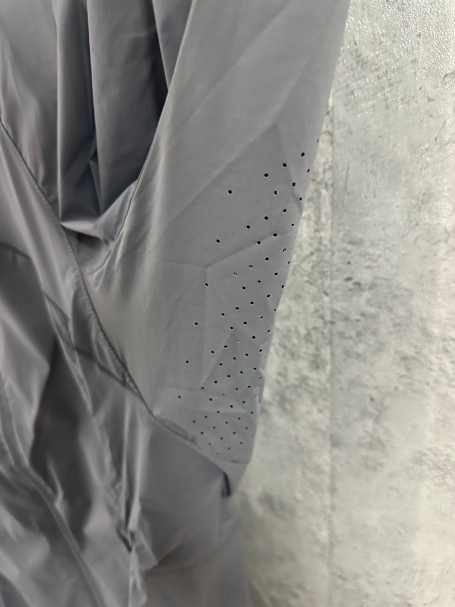 Ralph Lauren gray jacket sleeve with perforated ventilation panel