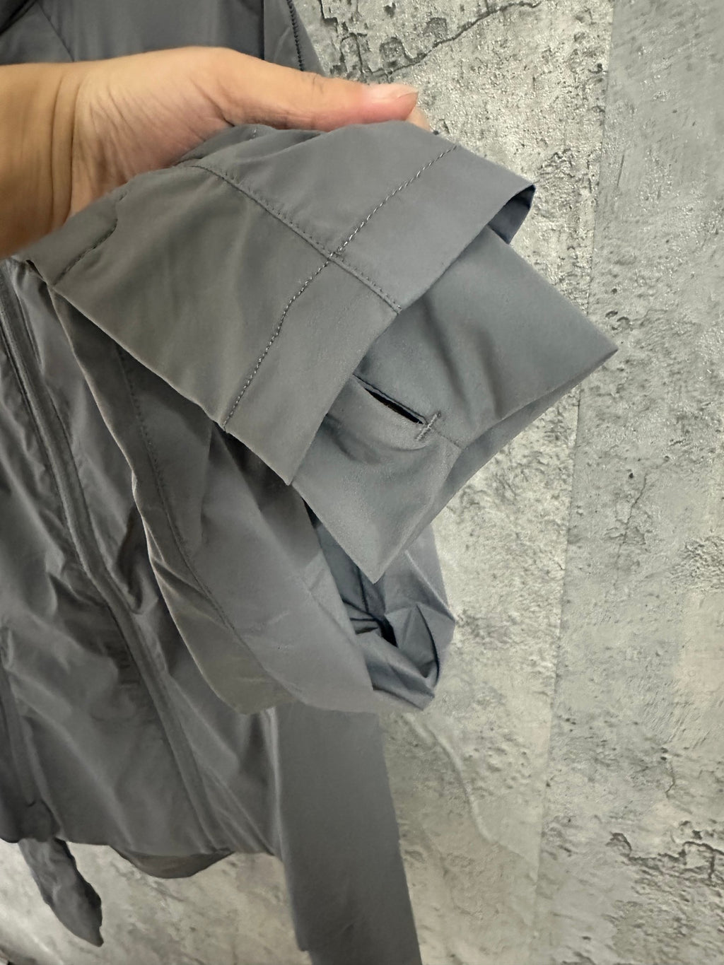 Ralph Lauren gray jacket back yoke close-up, shown on hanger