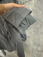 Ralph Lauren gray jacket back yoke close-up, shown on hanger