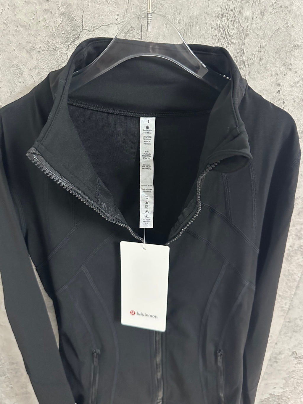 Ralph Lauren zip-up jacket with interior tag attached, front view