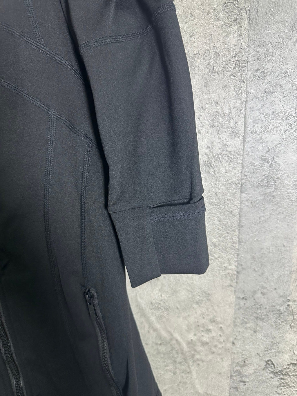 Ralph Lauren dark jacket sleeve cuff with stitch line and pocket detail