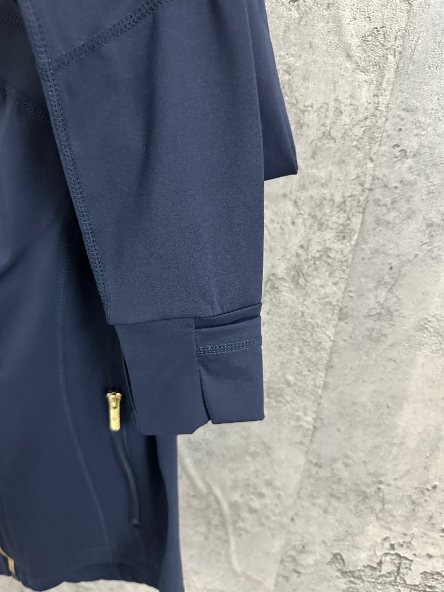 Ralph Lauren navy jacket sleeve and cuff with small zipper pocket detail