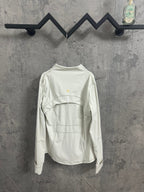 White zip-up jacket, back view with curved yoke seam and stand collar