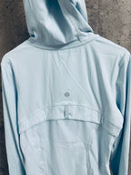 Light blue hooded zip jacket back with small logo at upper back