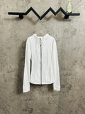 White zip-up hooded jacket with long sleeves and front pockets