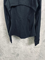 Dark hooded jacket back view with curved hem and long sleeves