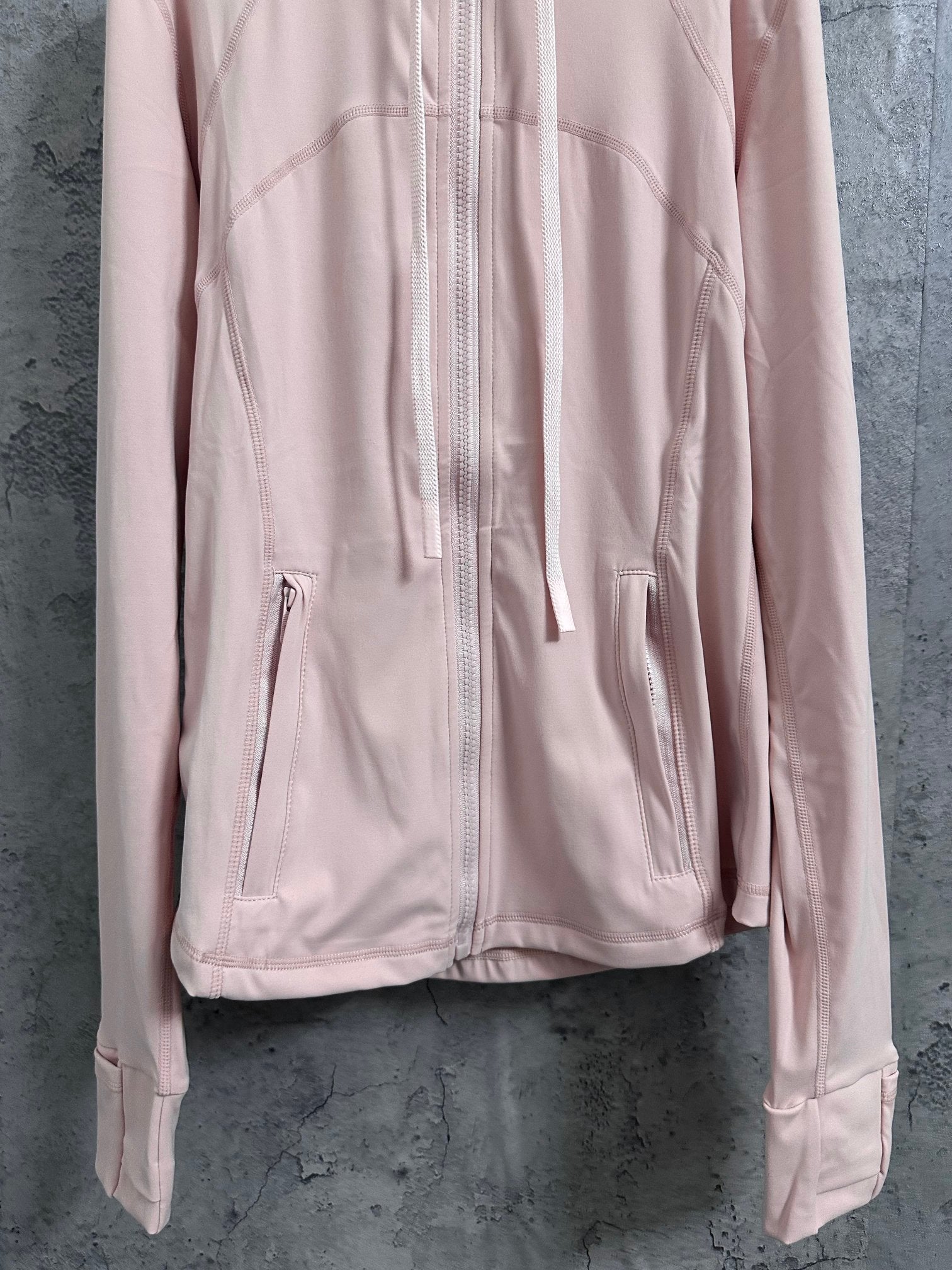 Ralph Lauren pink full-zip jacket with front zip pockets and elastic cuffs