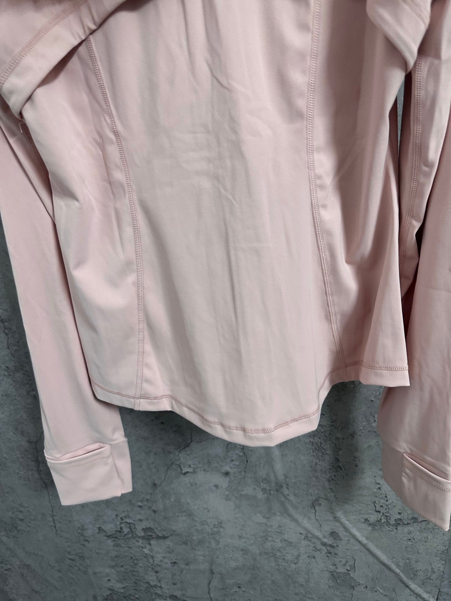 Ralph Lauren pink hooded zip jacket back with curved seam and lower hem pocket