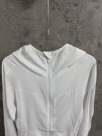 White hooded zip jacket front view with high collar