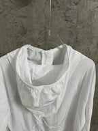 White hooded jacket neckline with draped hood and long sleeves