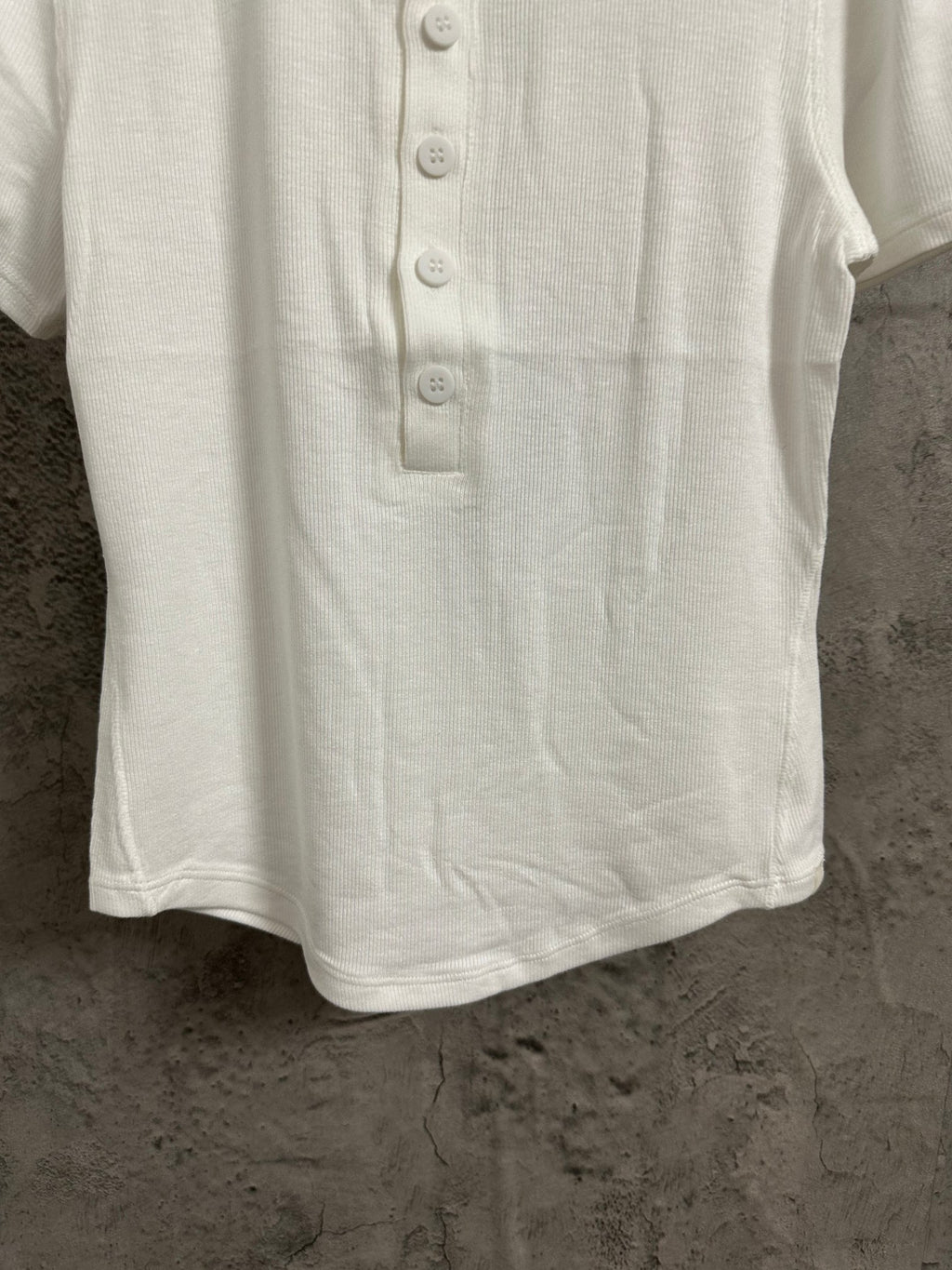 White henley T-shirt front with three-button placket and short sleeves