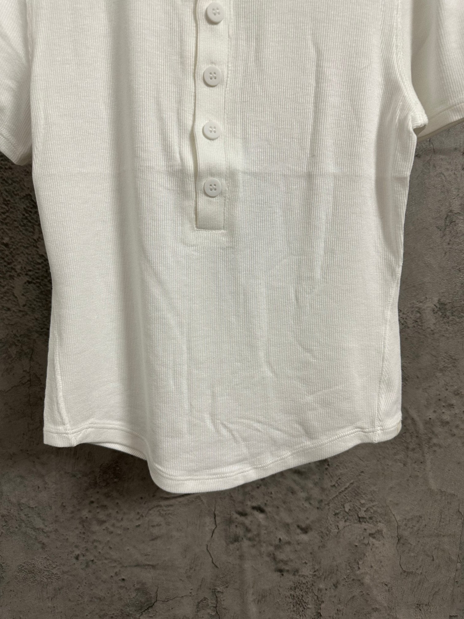 White henley T-shirt front with three-button placket and short sleeves