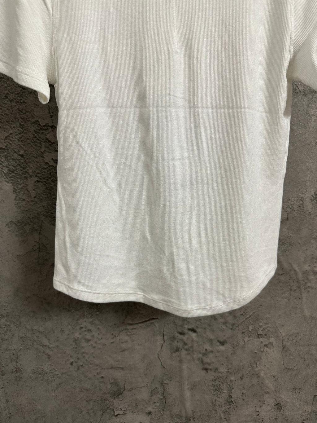 White henley T-shirt back view with curved hem and short sleeves