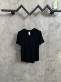 Short-sleeve henley shirt in dark knit fabric, with button placket and crew neck.