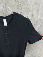 Dark ribbed henley shirt with short sleeves and front button details