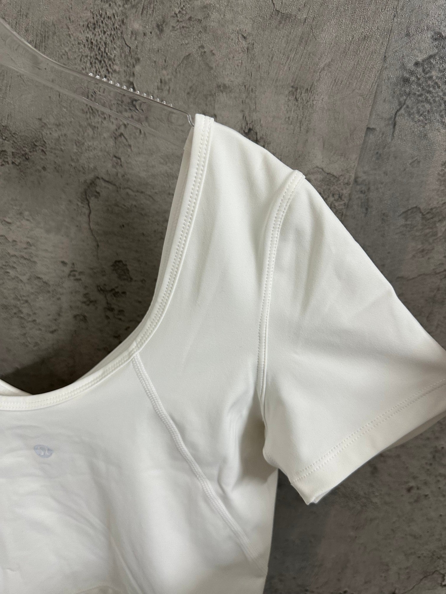 Ralph Lauren white scoop-neck crop T-shirt, side view with stitched seams