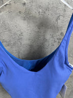 Blue ribbed tank top close-up, wide scoop back with thin straps
