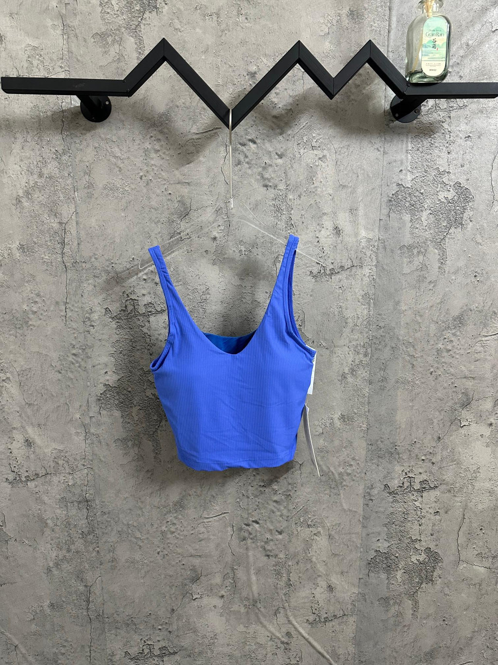 Blue ribbed camisole tank top with wide straps and scoop neckline