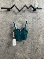 Teal ribbed camisole with V neckline, white-trimmed straps, tags attached