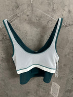 White and teal two-tone camisole with V neckline and wide straps