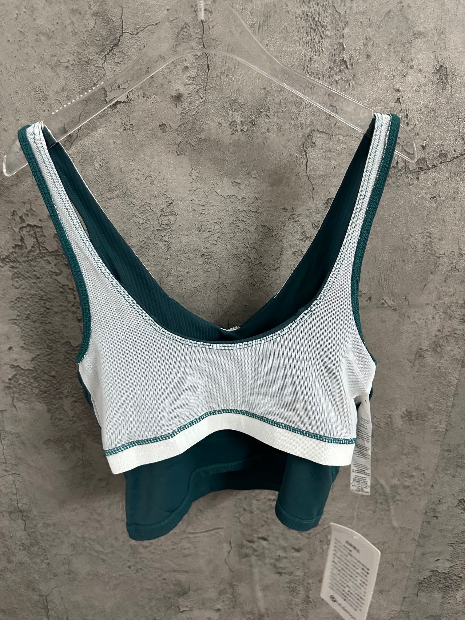 White and teal two-tone camisole with V neckline and wide straps