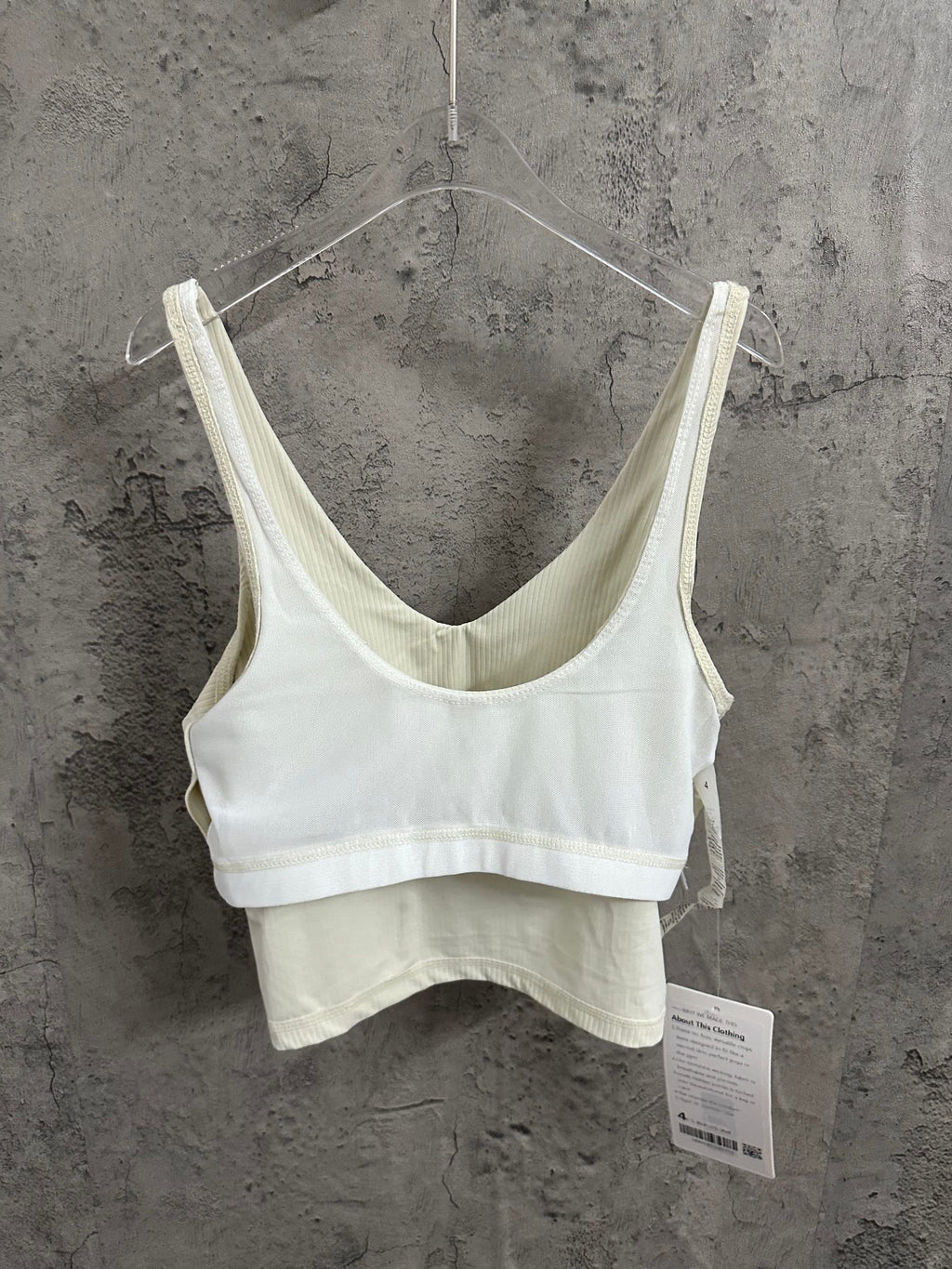 Light cream ribbed camisole with V-neck and thin shoulder straps