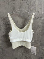 Light cream ribbed camisole with V-neck and thin shoulder straps
