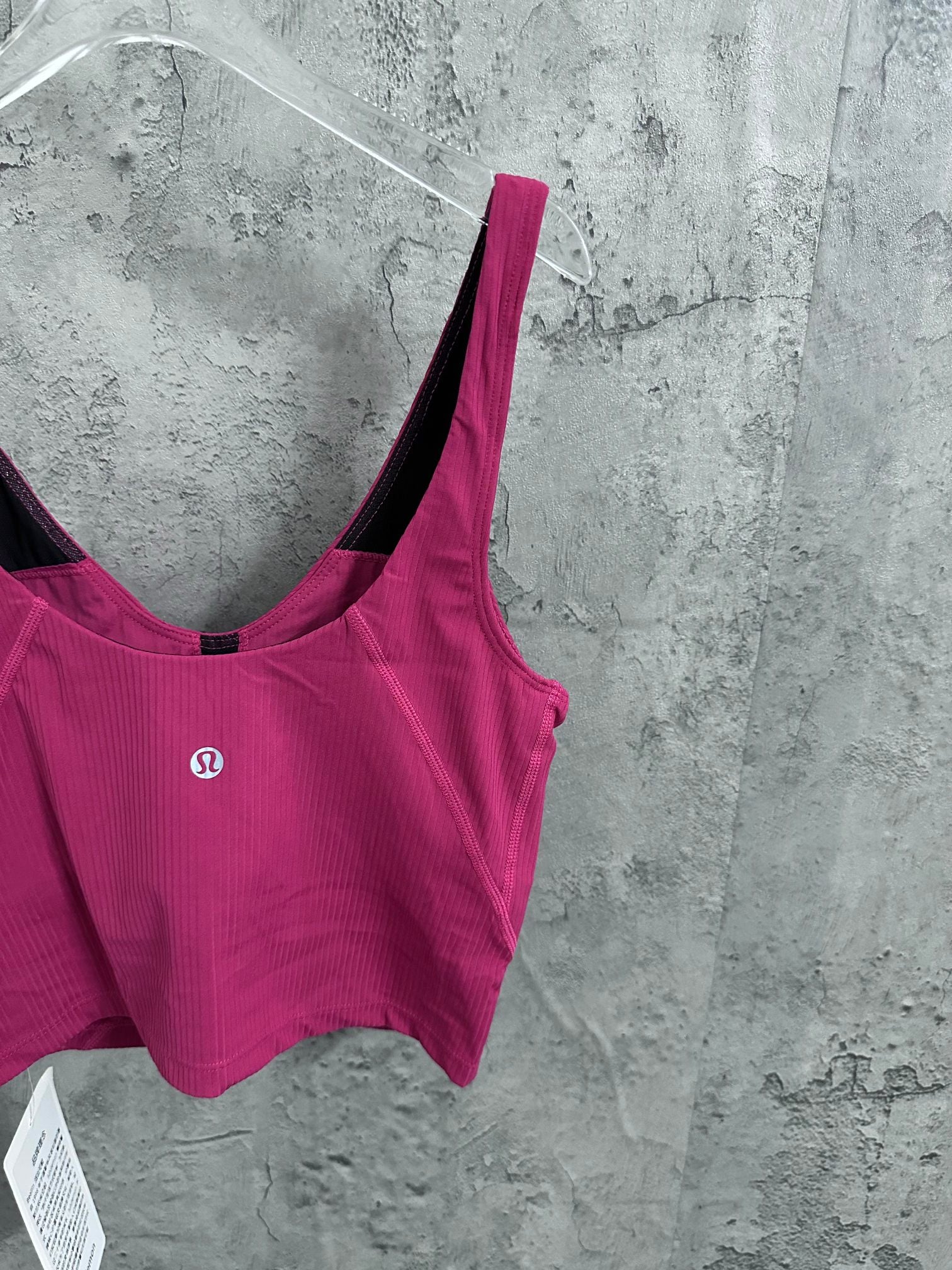 Ralph Lauren fuchsia crop camisole with black interior at neckline and small logo