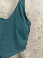 Teal ribbed camisole tank with wide straps and curved hem