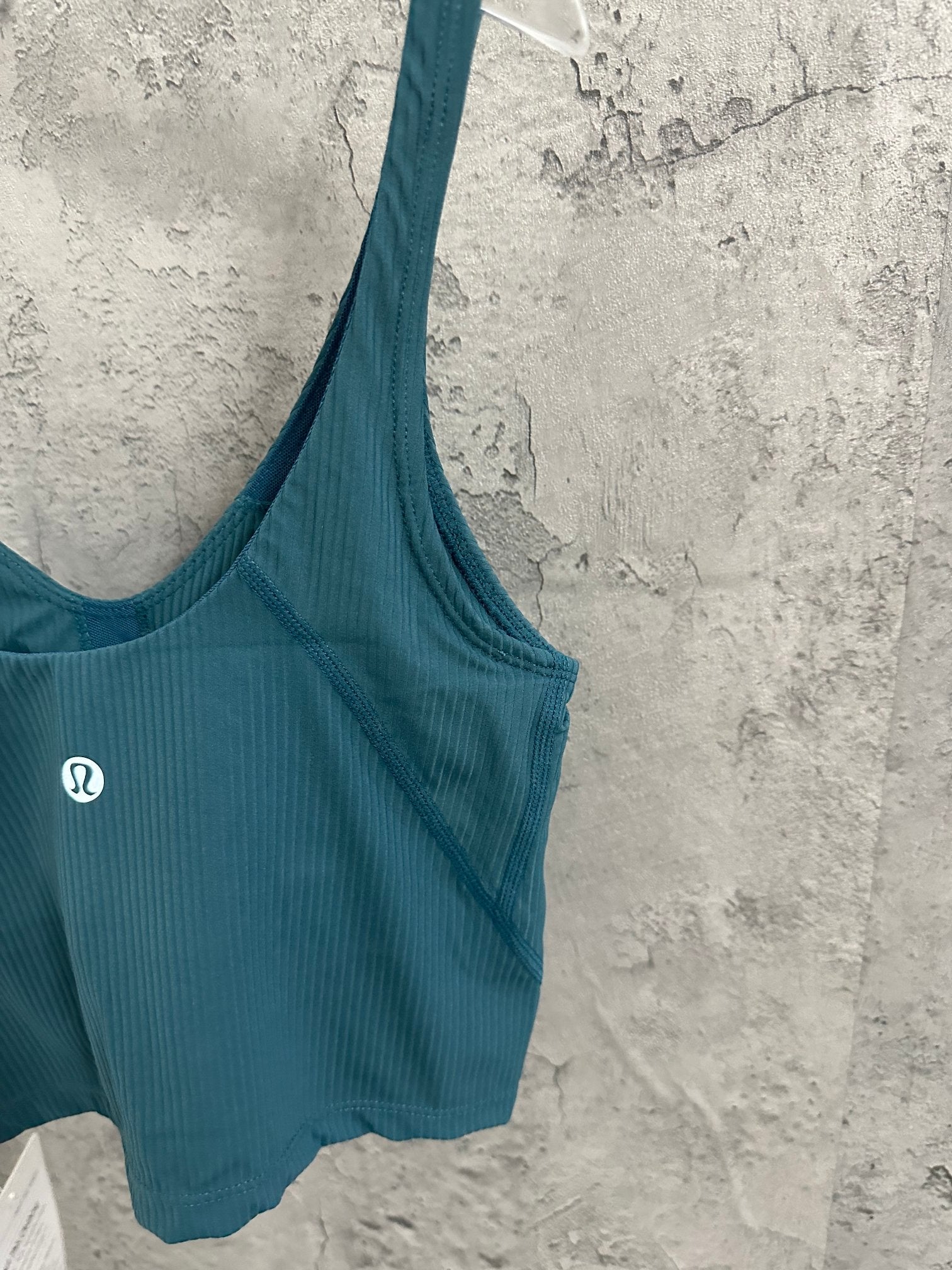 Teal tank top front view with wide straps and scoop neckline