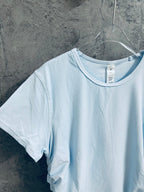 Light blue ribbed crew-neck T-shirt close-up with short sleeves and neckline