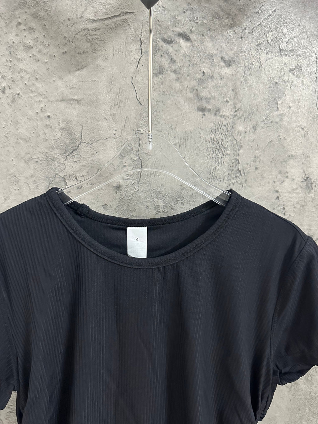 Dark crewneck T-shirt neckline with ribbed collar