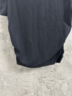 Dark navy T-shirt back with gathered fabric at lower hem