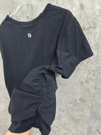Dark short-sleeve T-shirt with front twist detail