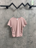 Light pink ribbed crew-neck T-shirt on hanger
