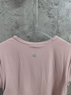 Light pink ribbed T-shirt back yoke with small logo